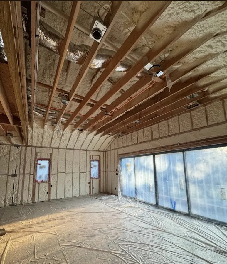 Interior walls and ceiling insulated with spray foam during new construction in Hazleton